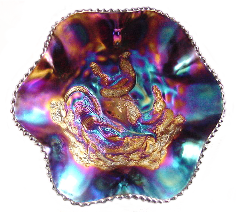 http://www.carnivalglassshowcase.com/mm5/graphics/00000001/dugan-farmyard-purple-six-ruffle-bowl-curtis-1.png